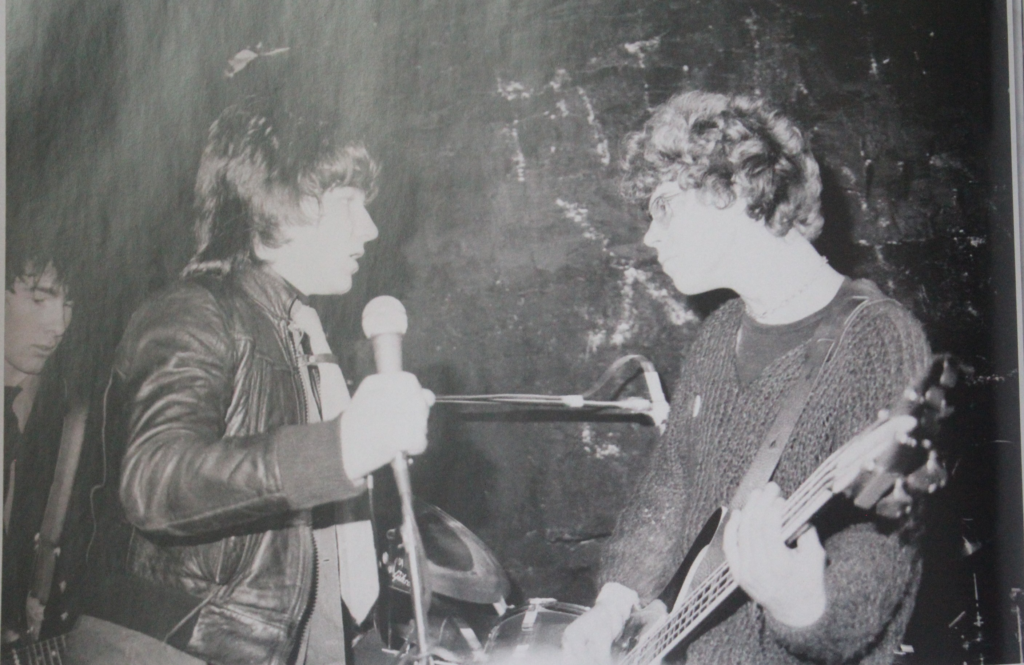 Bono and Adam Clayton on stage at McGonagles Dublin 1979